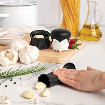 Ototo 2pc Crush N’ Roll Garlic Crusher And Peeler Silicone And Plastic Kitchen Tool Black/ White 2 Ototo 2pc Crush N’ Roll Garlic Crusher And Peeler Silicone And Plastic Kitchen Tool Black/ White - Image 2