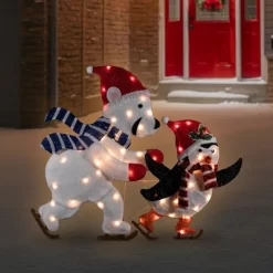 Northlight 41.25" Lighted Ice Skating Polar Bear And Penguin Outdoor Christmas Decoration