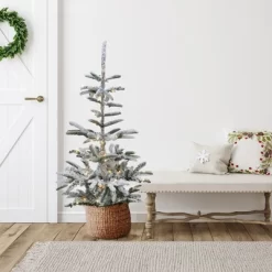 Northlight Real Touch™️ Pre-Lit Slim Flocked Nordmann Fir Artificial Christmas Tree - 4.5' - Warm Clear LED Lights